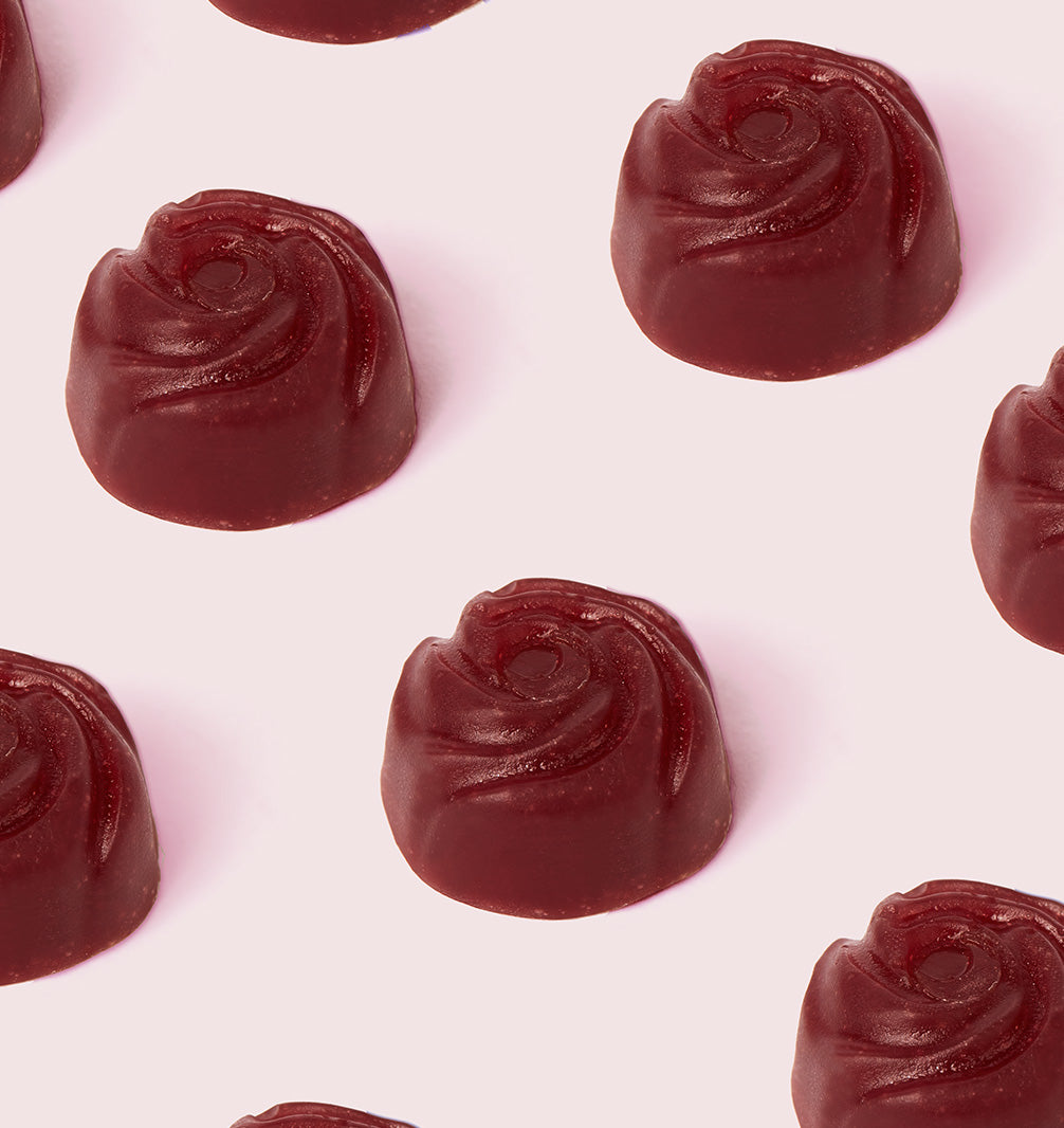A repeat pattern of close-up, gummy view showing texture