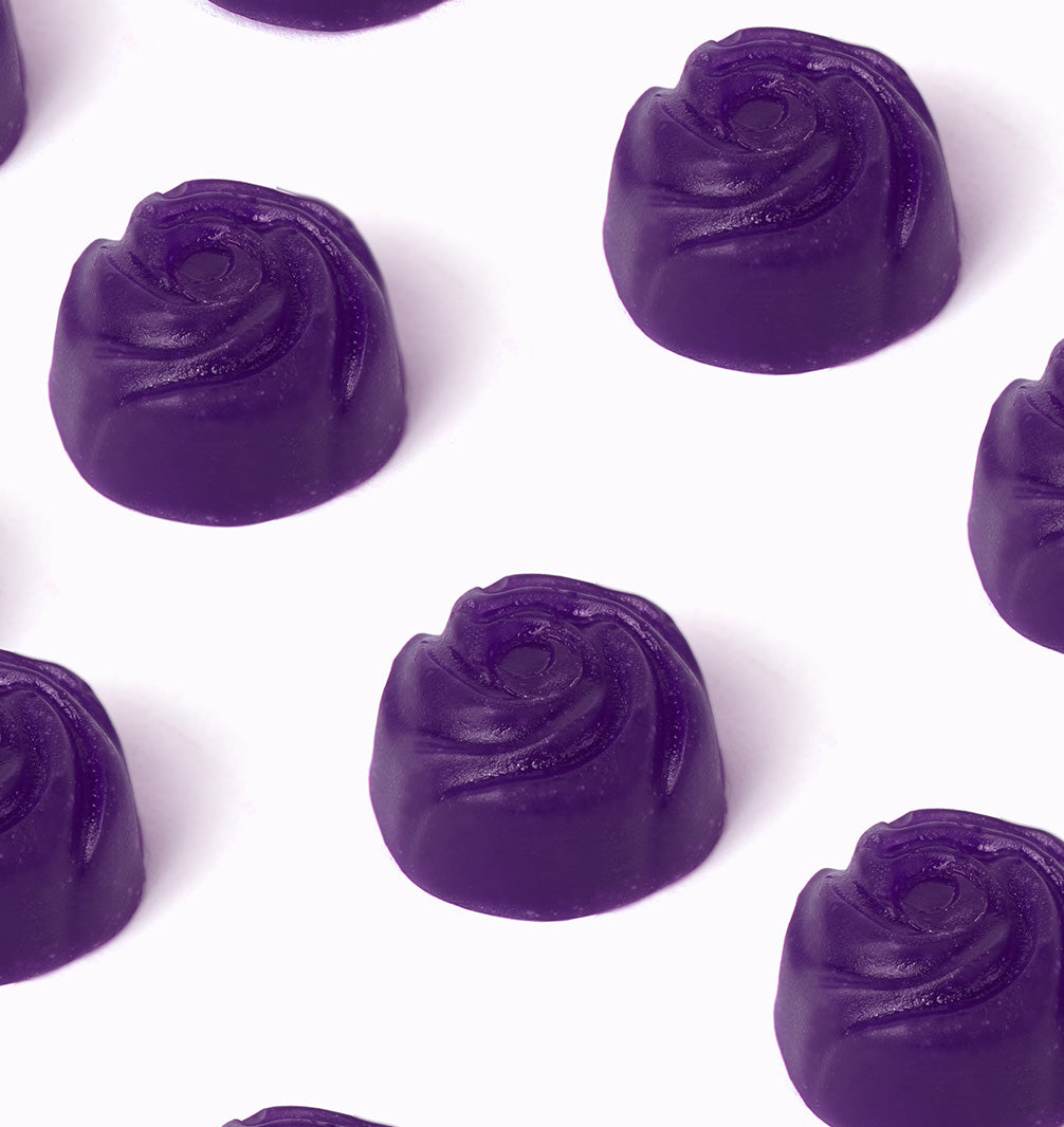 A repeat pattern of close-up, gummy view showing texture
