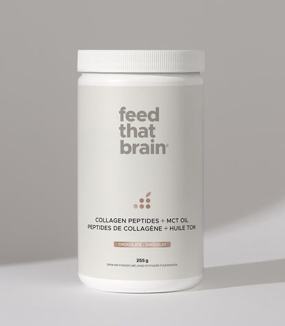 Container of 'feed that brain' supplement on a gray background